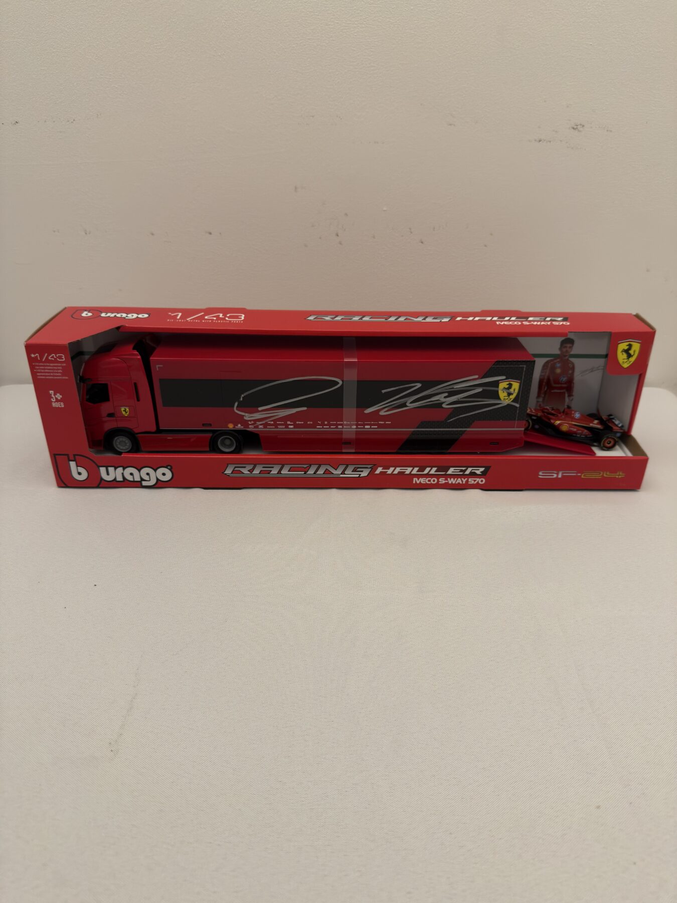 Burago-Ferrari 1/43 hauler-Signed by Lewis Hamilton and Charles Leclerc