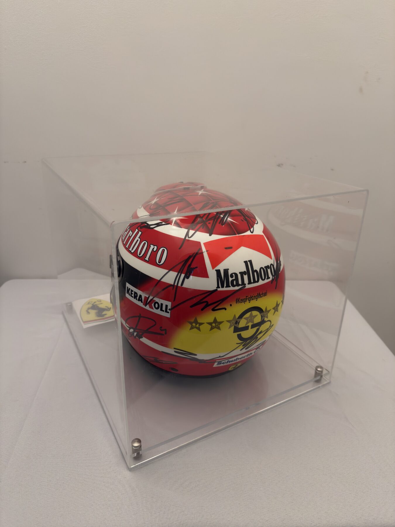Michael Schumacher QM1 helmet multi signed by all 2025 F1 drivers and Michael Schumacher on the visor - Image 5