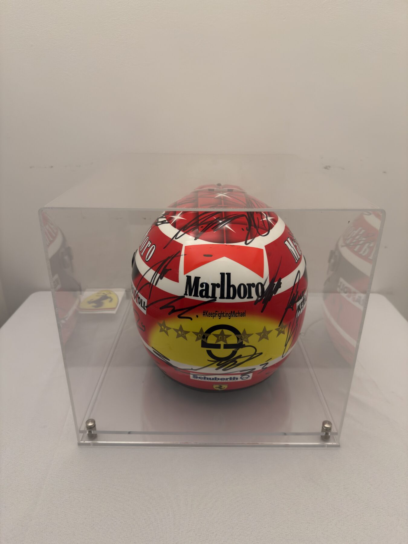 Michael Schumacher QM1 helmet multi signed by all 2025 F1 drivers and Michael Schumacher on the visor - Image 4