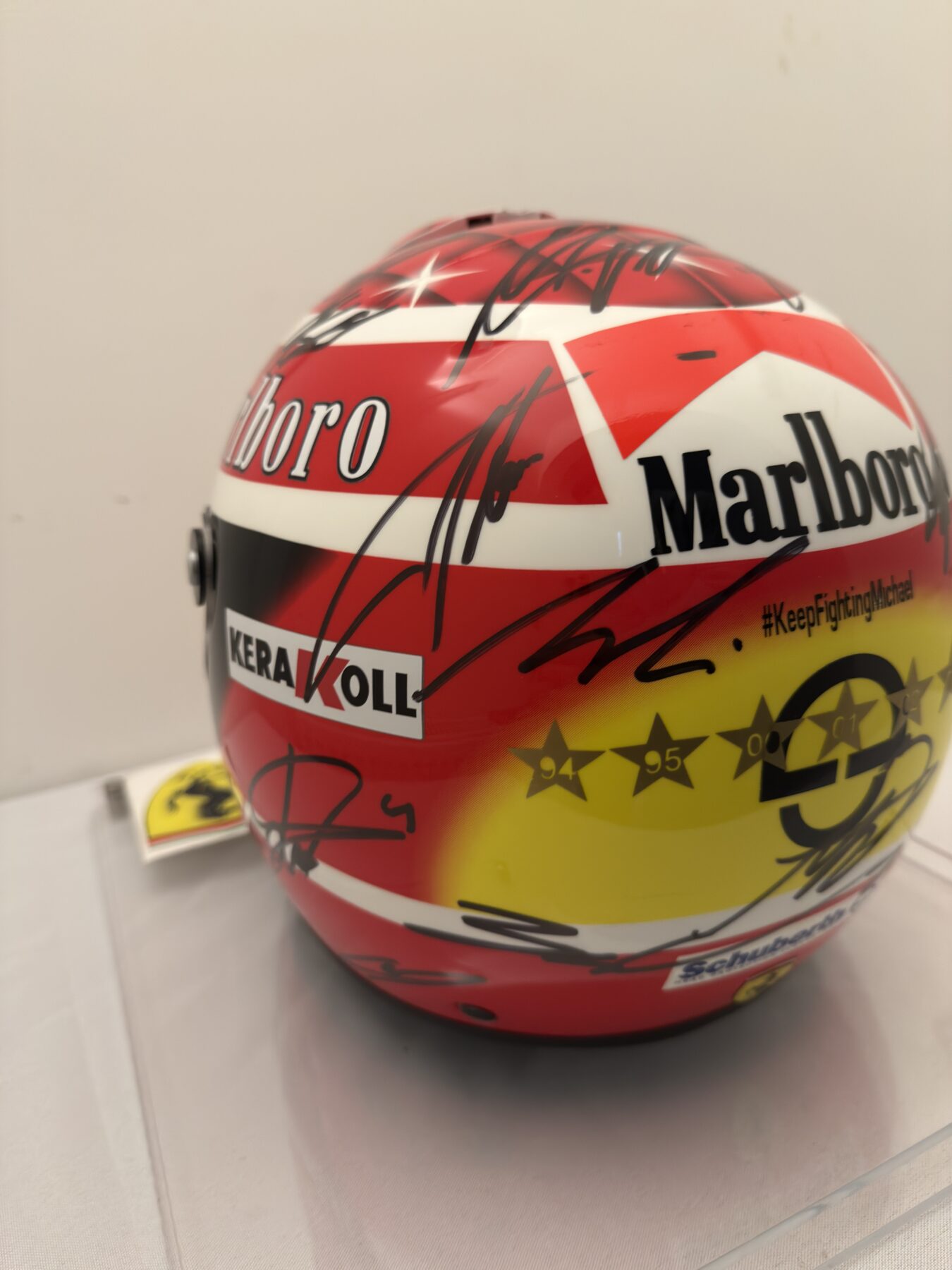 Michael Schumacher QM1 helmet multi signed by all 2025 F1 drivers and Michael Schumacher on the visor - Image 18