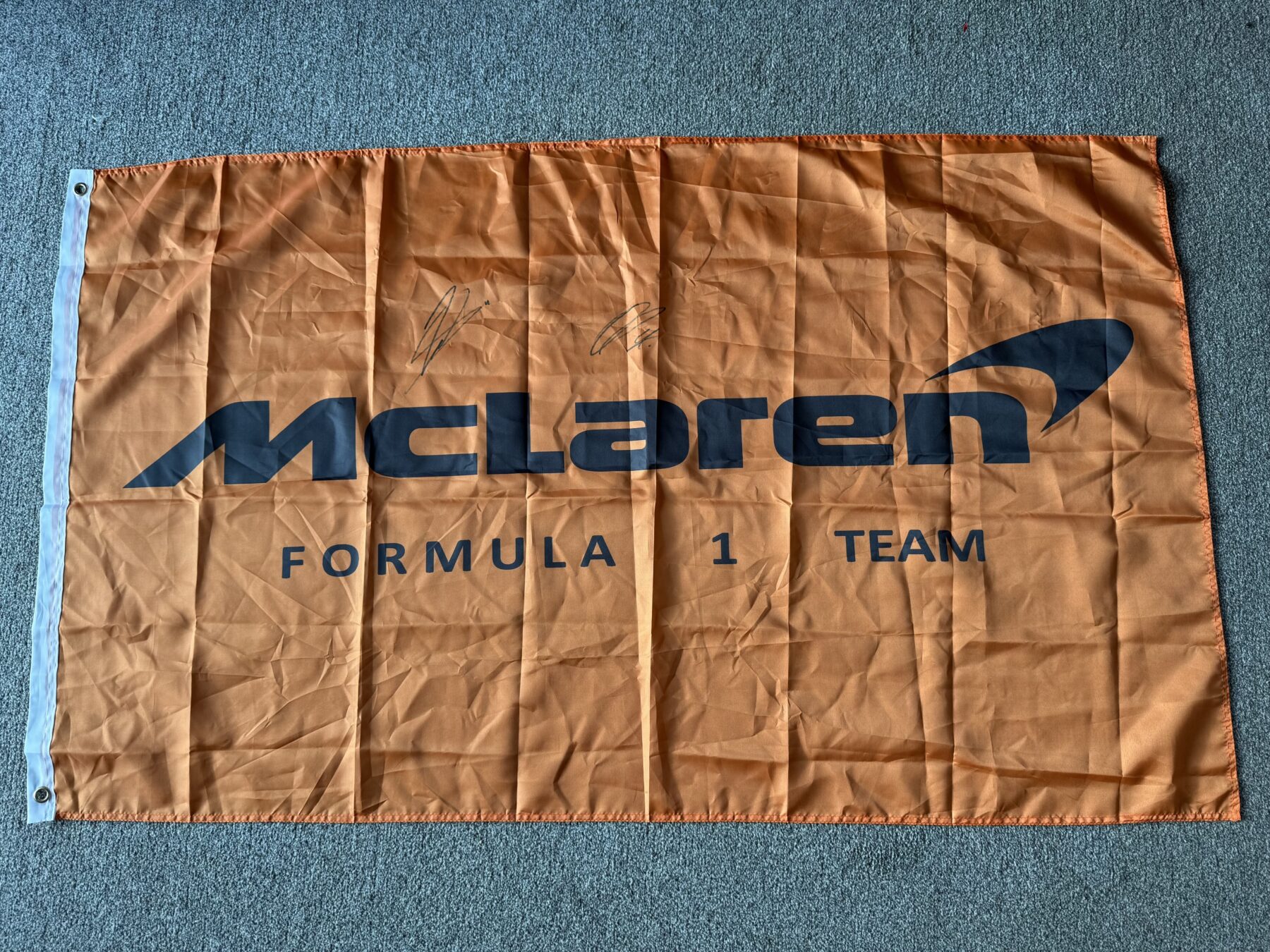 McLaren flag Signed by Lando Norris and Oscar Piastri