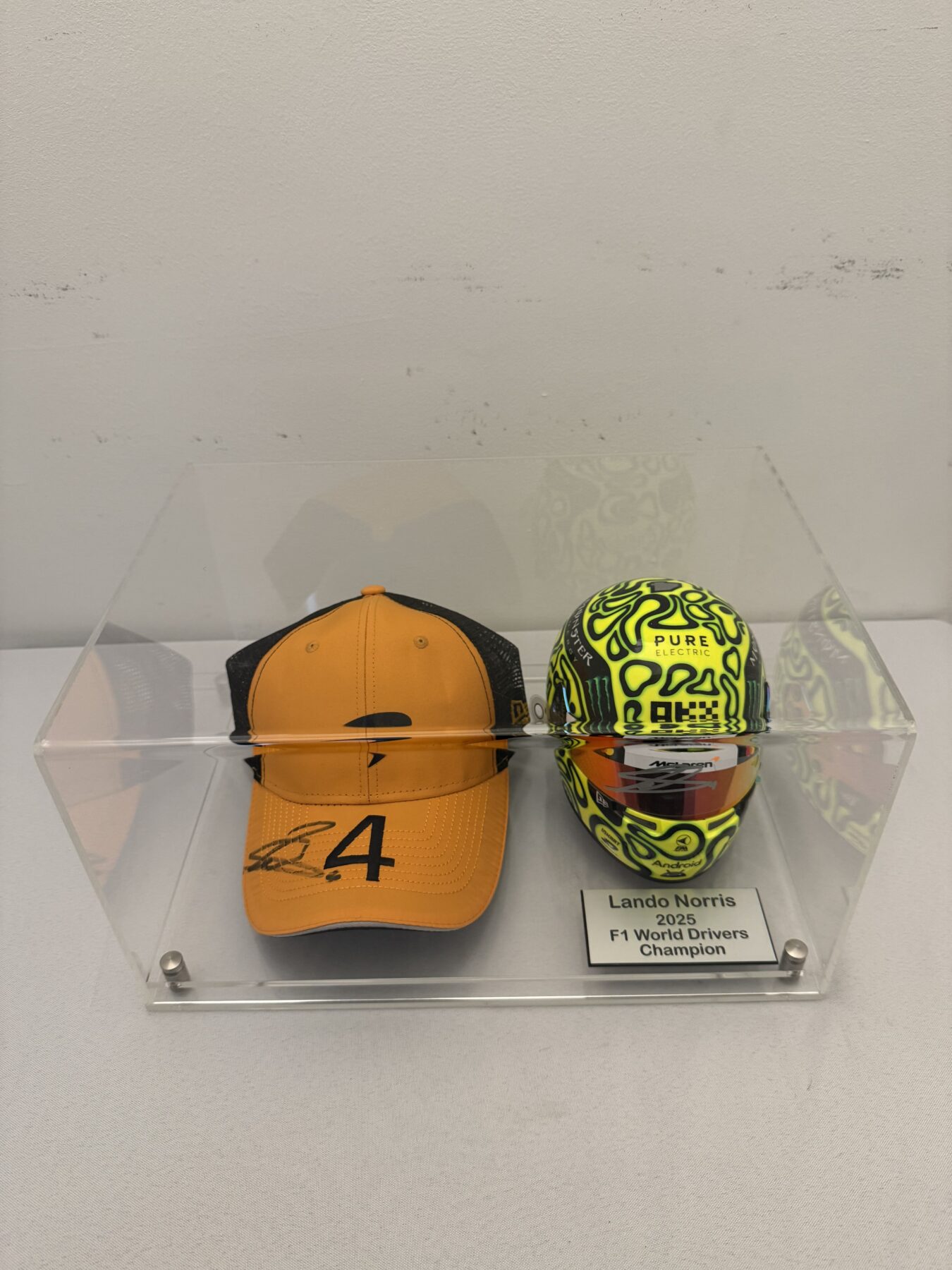 Lando Norris Signed Bell 1:2 Scale F1 Helmet and Cap Display Set - Image 4