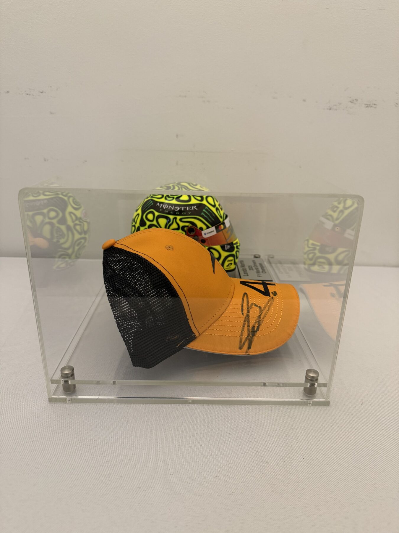 Lando Norris Signed Bell 1:2 Scale F1 Helmet and Cap Display Set - Image 6