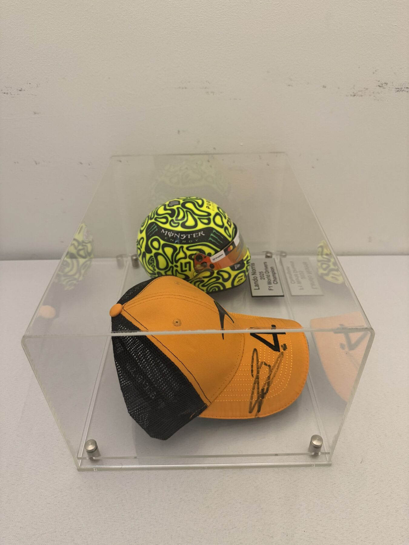 Lando Norris Signed Bell 1:2 Scale F1 Helmet and Cap Display Set - Image 9
