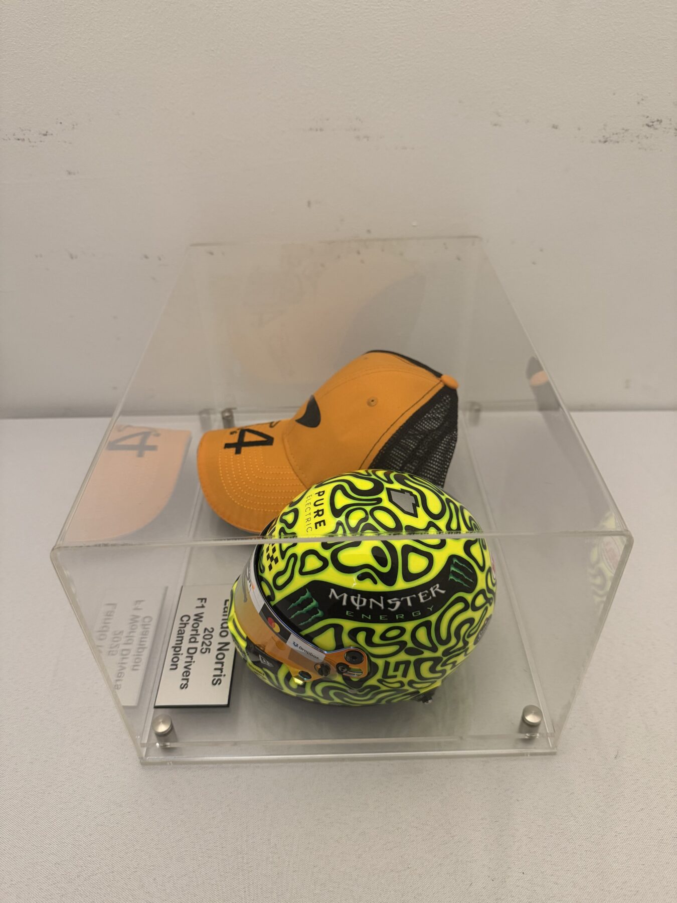 Lando Norris Signed Bell 1:2 Scale F1 Helmet and Cap Display Set - Image 8