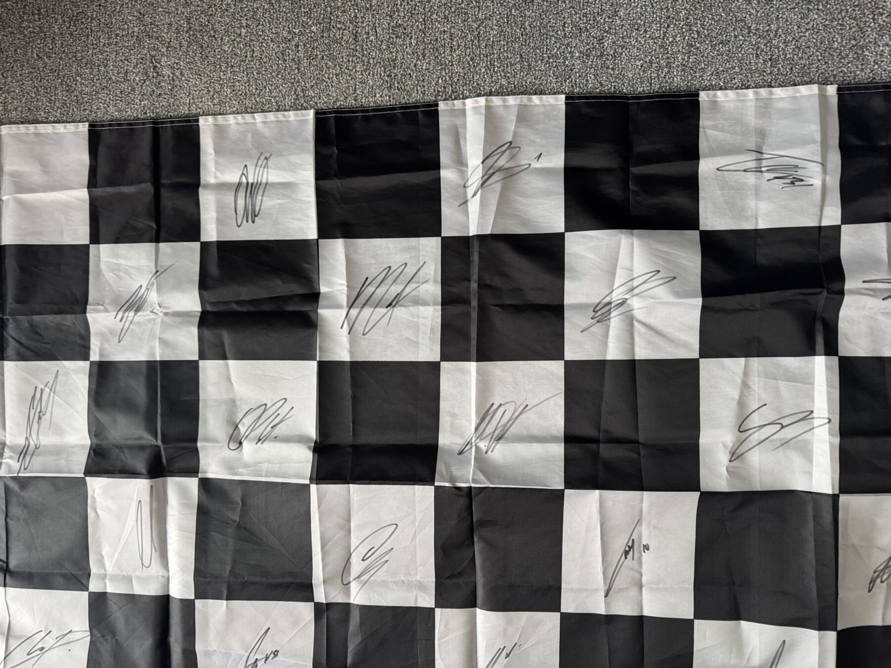 Multi Signed chequered flag -22 autographs from all 2026 F1 drivers