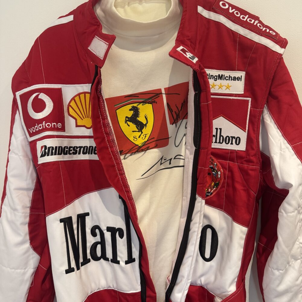 Michael Schumacher “Keep Fighting Michael” tribute suit and multi signed T shirt