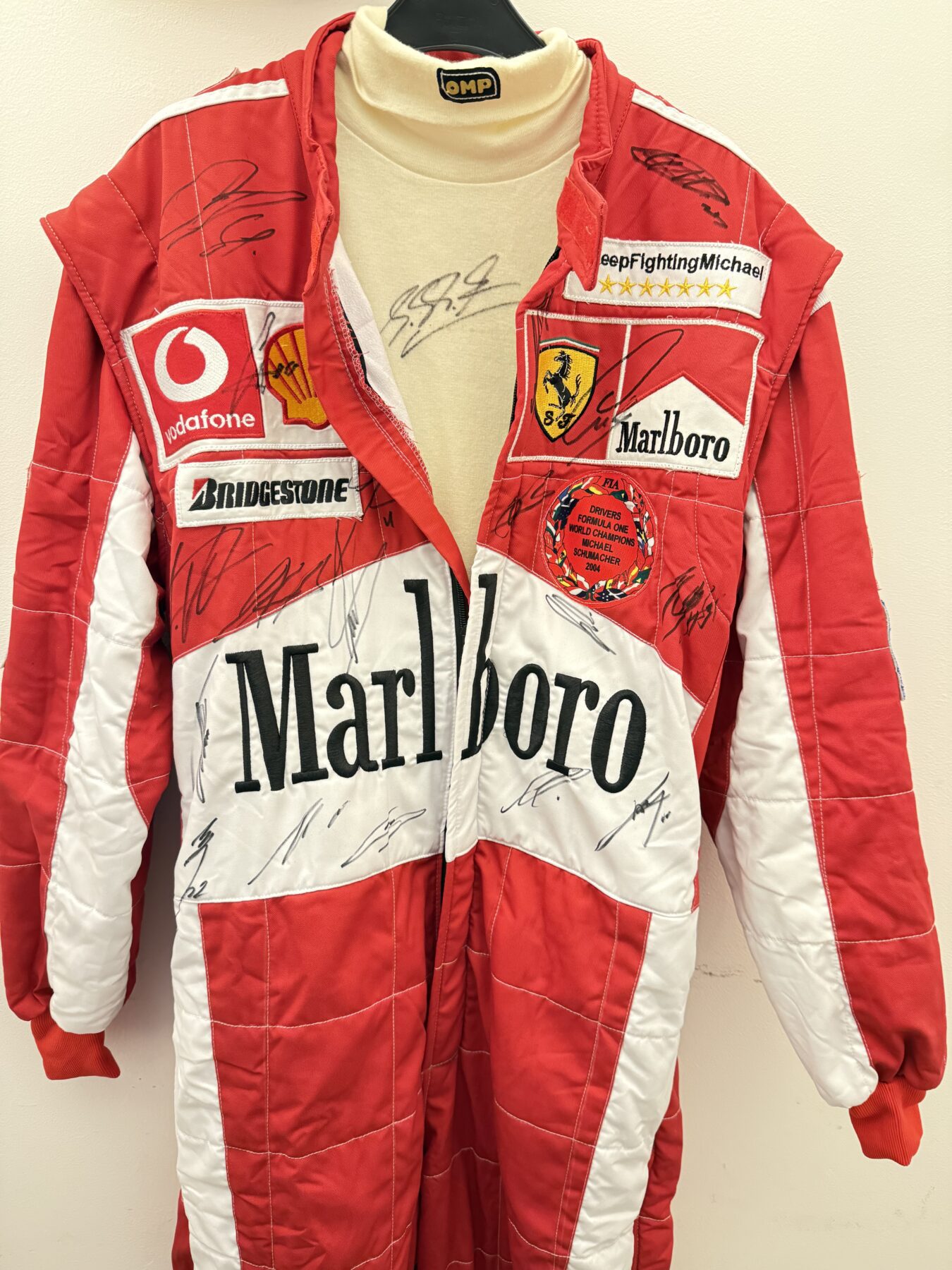 NEW-Michael Schumacher-Multi Signed suit & Signed Michael