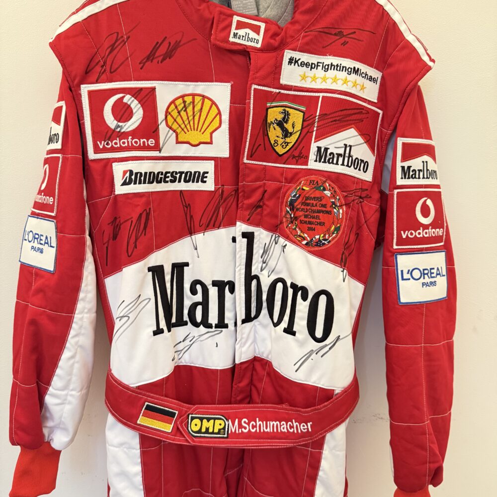 Michael Schumacher-Multi Signed Suit-Signed separately by Michael